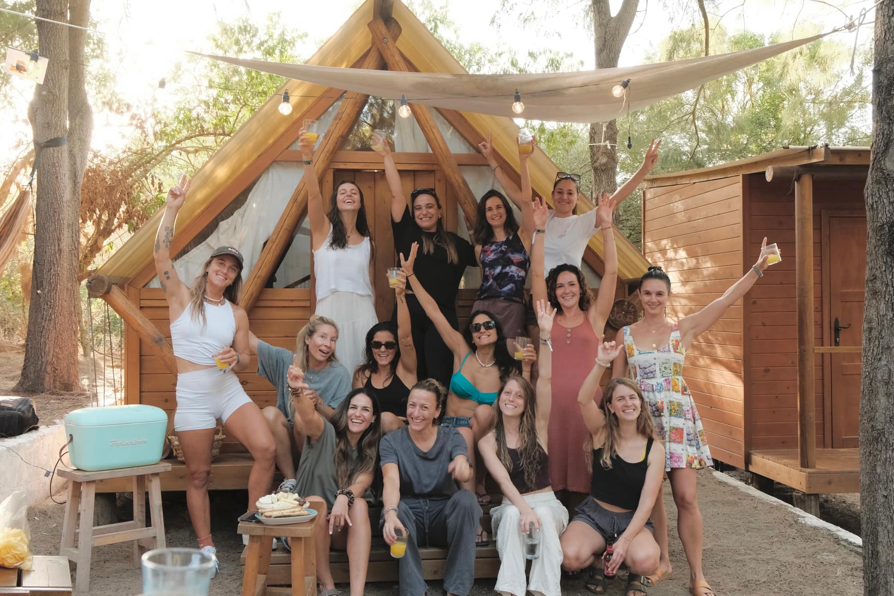 Women celebrating together at the Tarifa glamping house