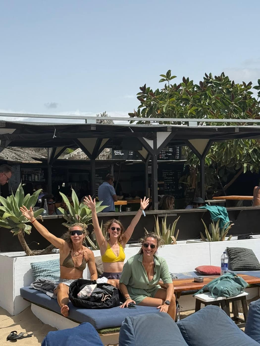 Women relaxing together at a Tarifa beach spot